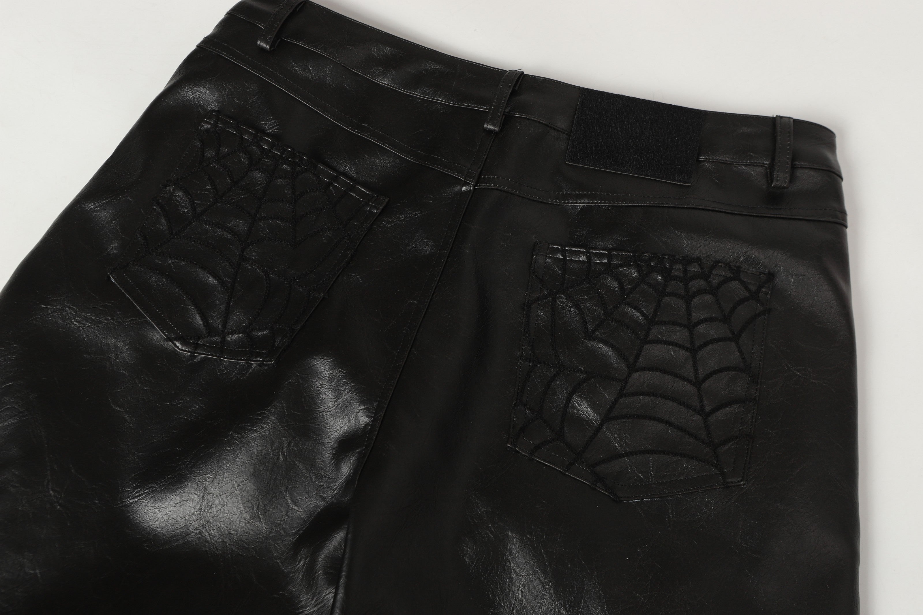 STARRVAINT Web Embossed PU Wide-Leg Pants